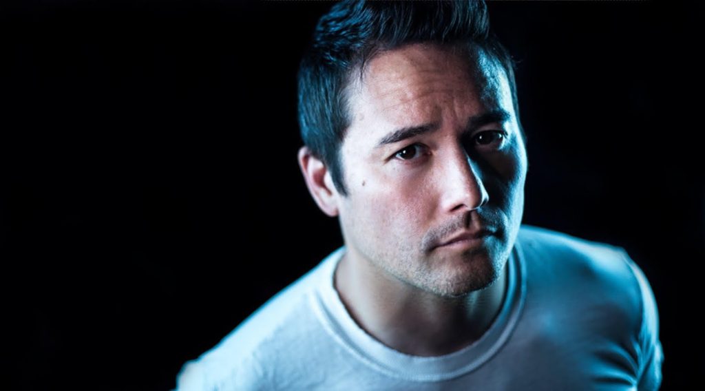 Johnny Yong Bosch headshot.