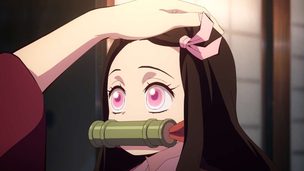 'Demon Slayer: Kimetsu No Yaiba -To The Swordsmith Village-' showing chibi Nezuko getting head pats.