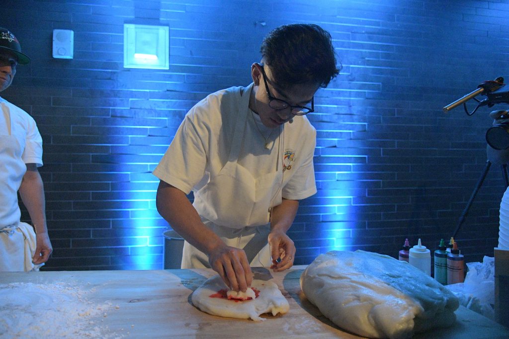 LOS ANGELES, CALIFORNIA - NOVEMBER 01: Dough is prepared during Netflix's "Blue Eye Samurai" LA Tastemaker at the Japanese American National Museum on November 01, 2023 in Los Angeles, California. (Photo by Charley Gallay/Getty Images for Netflix)