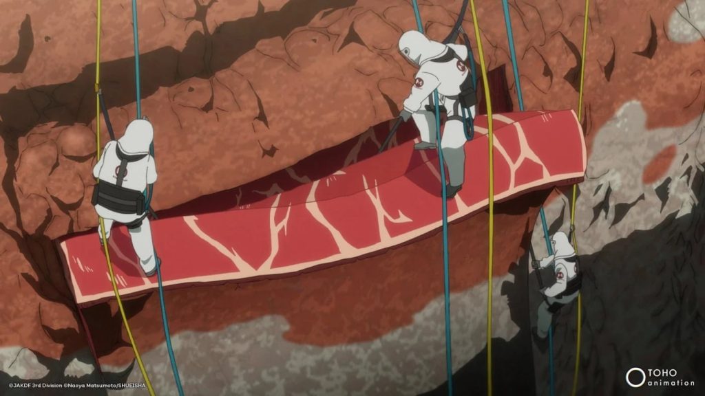 Kaiju No. 8 Ep. 1 "The Man Who Became a Kaiju" screenshot showing kaiju disposal workers cutting off a chunk of kaiju.