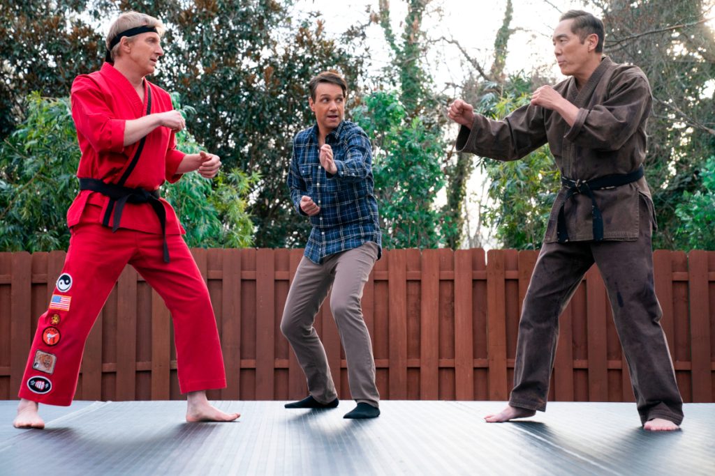 Cobra Kai. (L to R) William Zabka as Johnny Lawrence, Ralph Macchio as Daniel LaRusso, Yuji Okumoto as Chozen in Cobra Kai. Cr. Curtis Bonds Baker/Netflix © 2024