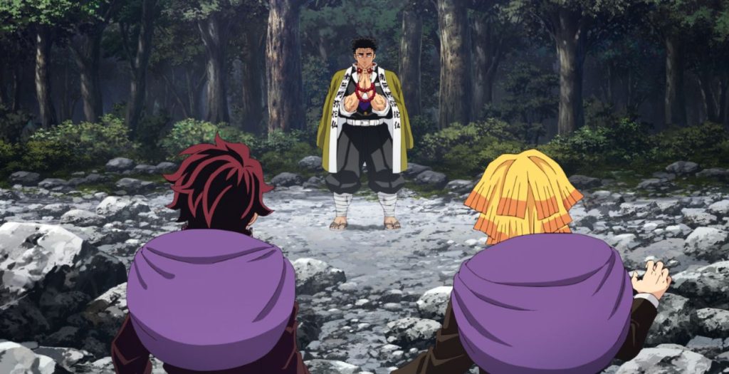 Demon Slayer: Kimetsu no Yaiba - Hashira Training Arc Ep. 6 "The Strongest of the Demon Slayer Corps" screenshot showing Tanjiro and Zenitsu standing in front of a praying Gyomei.