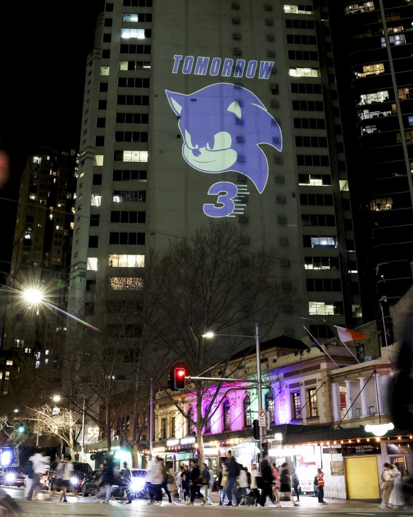 SYDNEY, AUSTRALIA - AUGUST 26: Characters from 'Sonic The Hedgehog 3' are projected onto buildings in Sydney CBD on August 26, 2024 in Sydney, Australia. Sonic the Hedgehog 3 projections featuring images of Sonic, Shadow, and the classic Robotnik icon appear in multiple cities and locations around the world. (Photo by Hanna Lassen/Getty Images for Paramount Pictures)