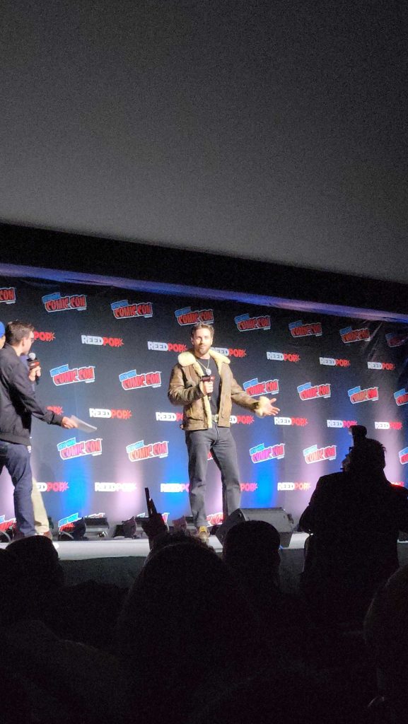 Aaron Taylor-Johnson speaking at Kraven theHunter panel at NYCC 2024.