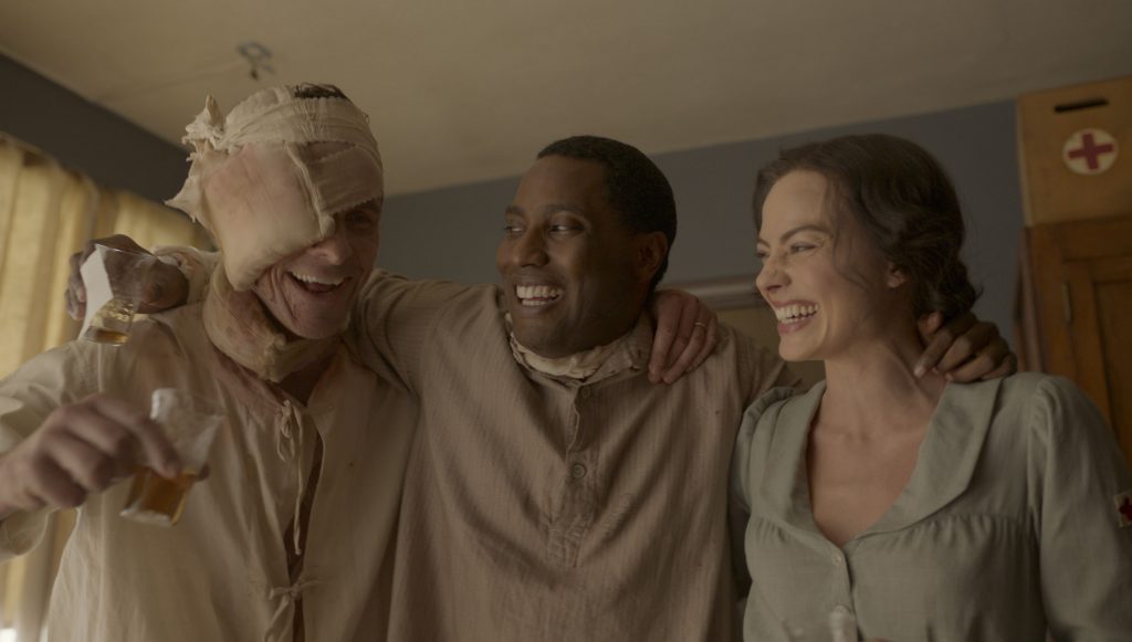 Amsterdam (L to R): Christian Bale as Burt, John David Washington as Harold, and Margot Robbie as Valerie